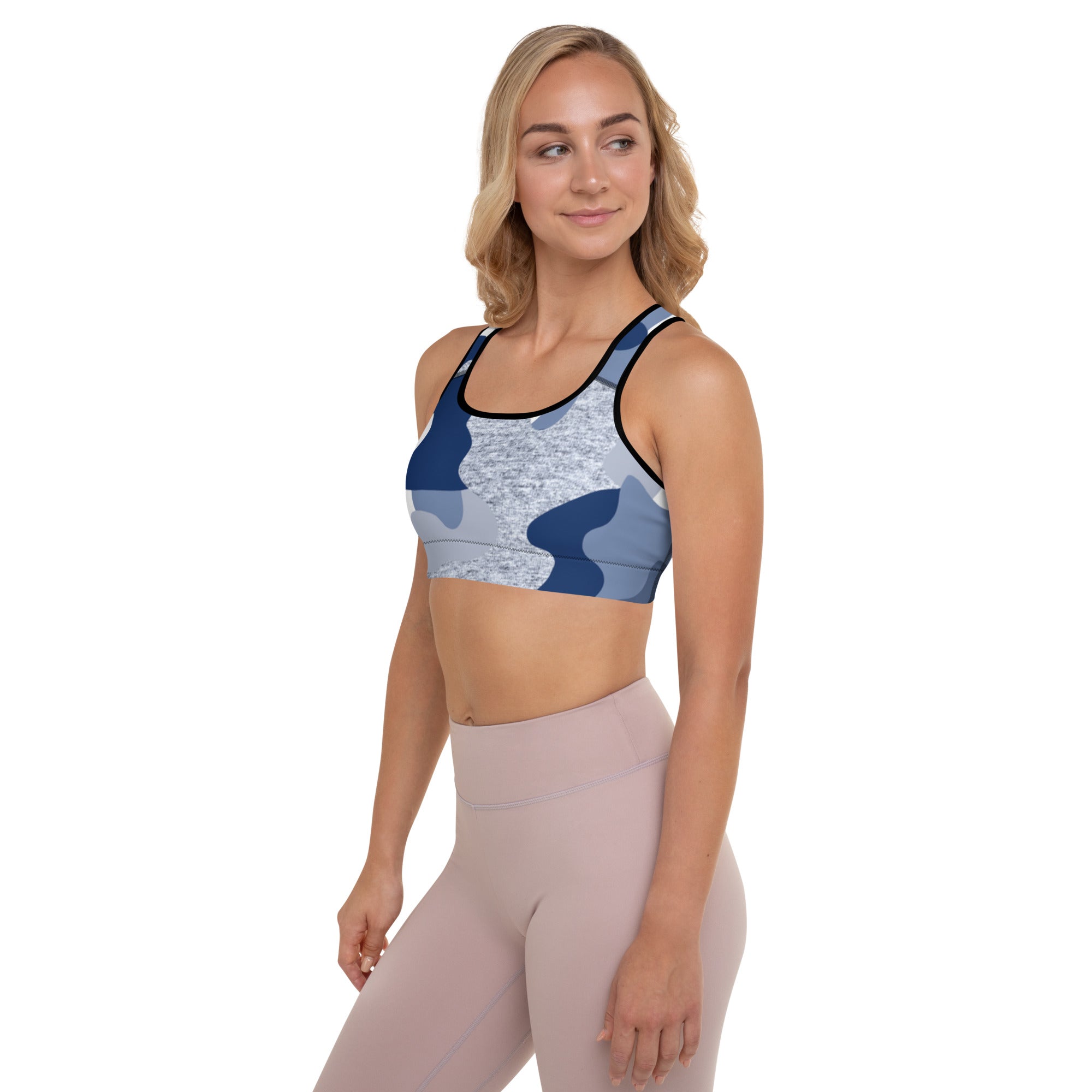 a woman wearing a Sweetest Paw Padded Sports Bra Camo.