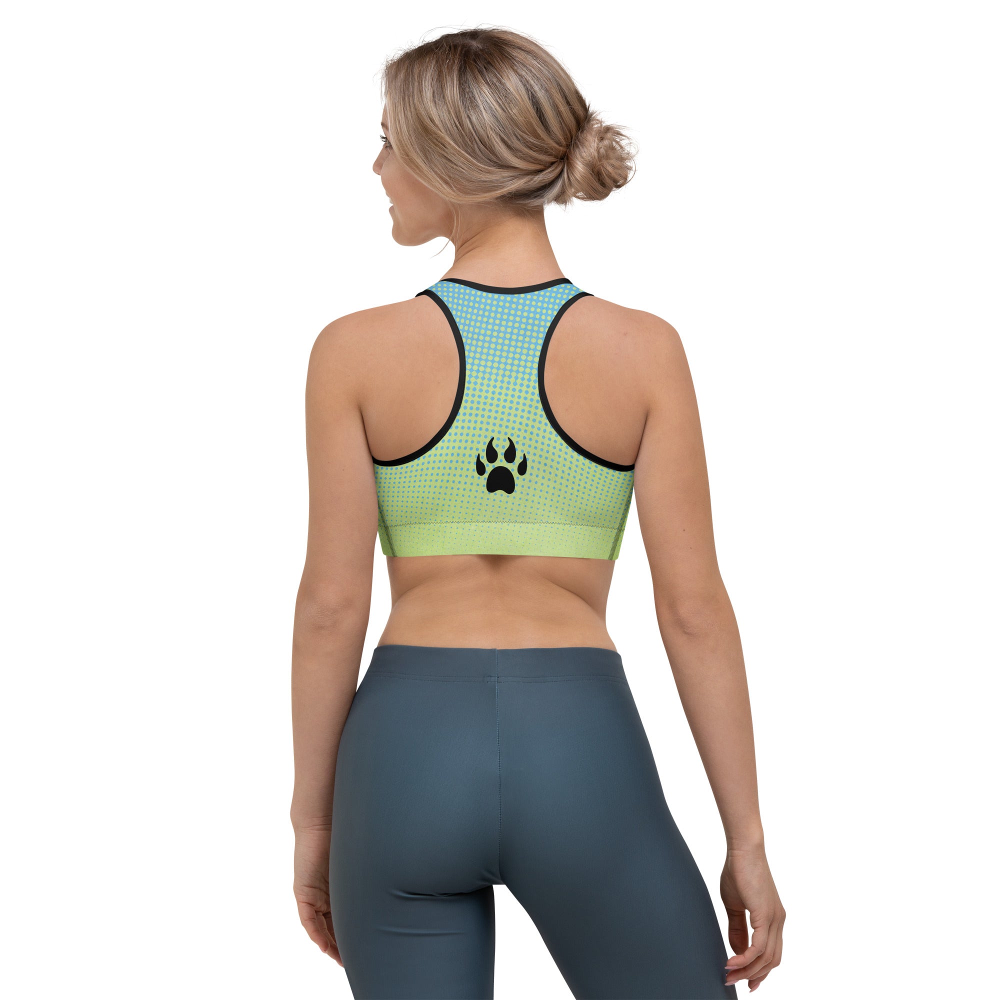 the back view of a woman wearing a Sweetest Paw Sports Bra Multi top.