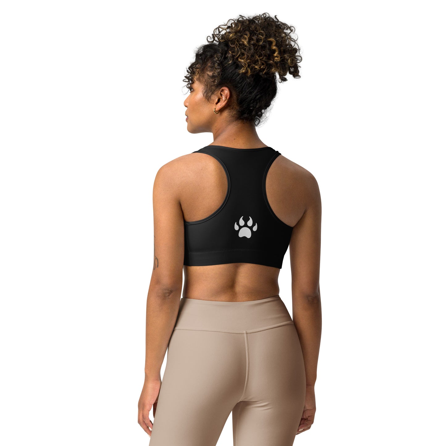 The back view of a woman wearing a Sweetest Paw Sports Bra Black.