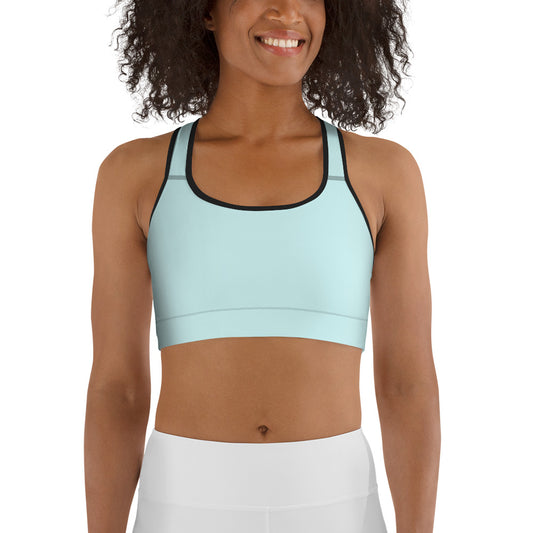 a woman wearing a Sweetest Paw Sports Bra Teal top.