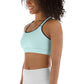 a woman wearing a Sweetest Paw Sports Bra Teal top.