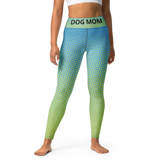 A woman wearing Sweetest Paw's Yoga Leggings Multi, which are blue and green polka dot.