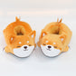 Two Cute Shiba Inu Dog Slippers by Sweetest Paw on a white surface.