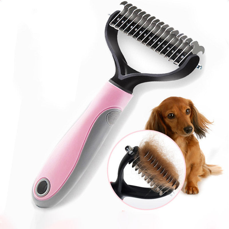 A pink and white Sweetest Paw Dog Comb Pet Hair Removal Comb with a pink comb.