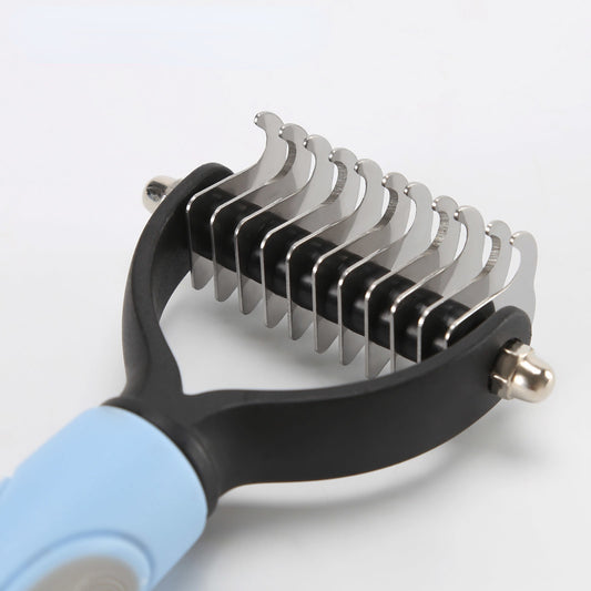 A Sweetest Paw dog grooming tool with a blue handle, specifically the Dog Comb Pet Hair Removal Comb.