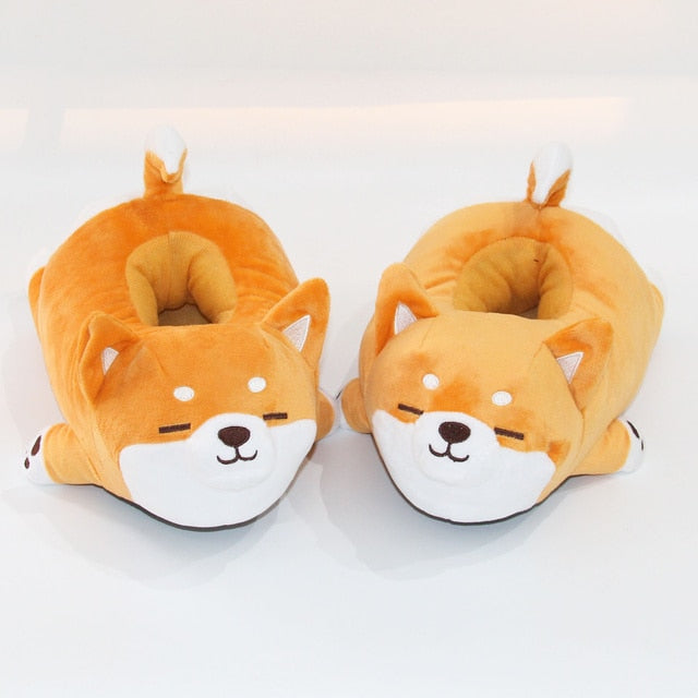 two Cute Shiba Inu Dog Slippers by Sweetest Paw on a white surface.