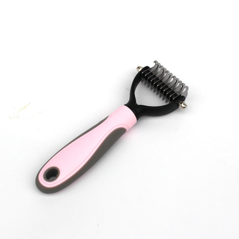 A Sweetest Paw Dog Comb Pet Hair Removal Comb on a white surface.